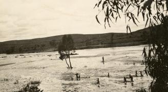 Children playing in the Finke River.
